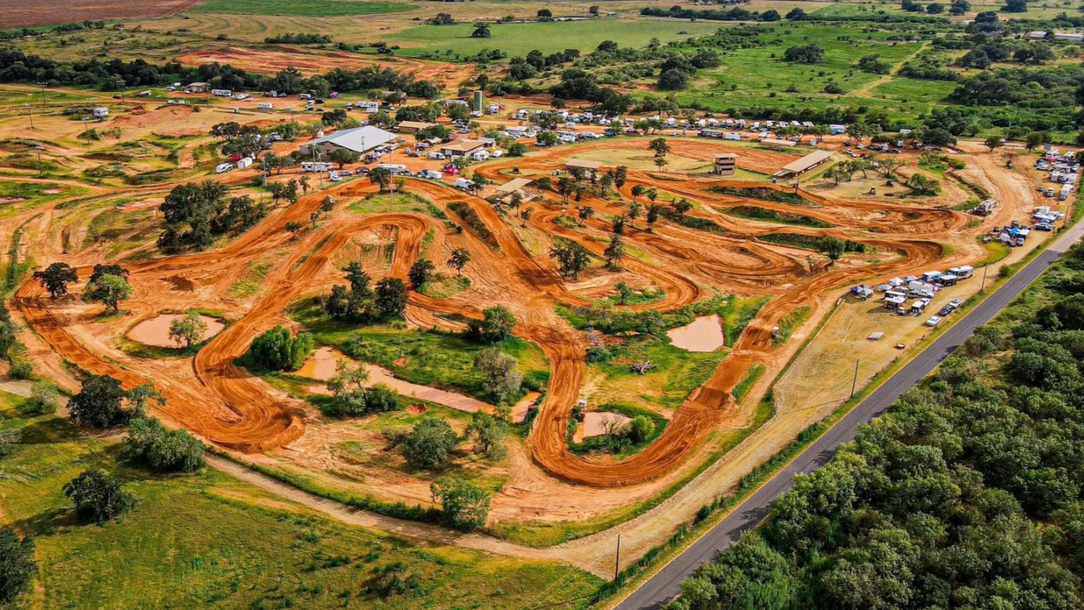 Aerial view of the Cycle Ranch MX motocross track and facility grounds in Texas